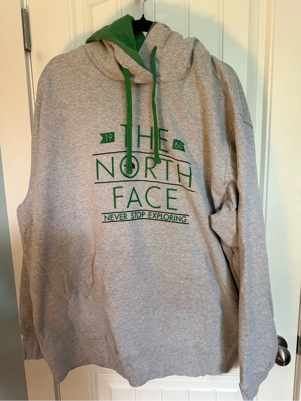 The North Face Men’s Light Gray Crewneck Hoodie with Green Accents